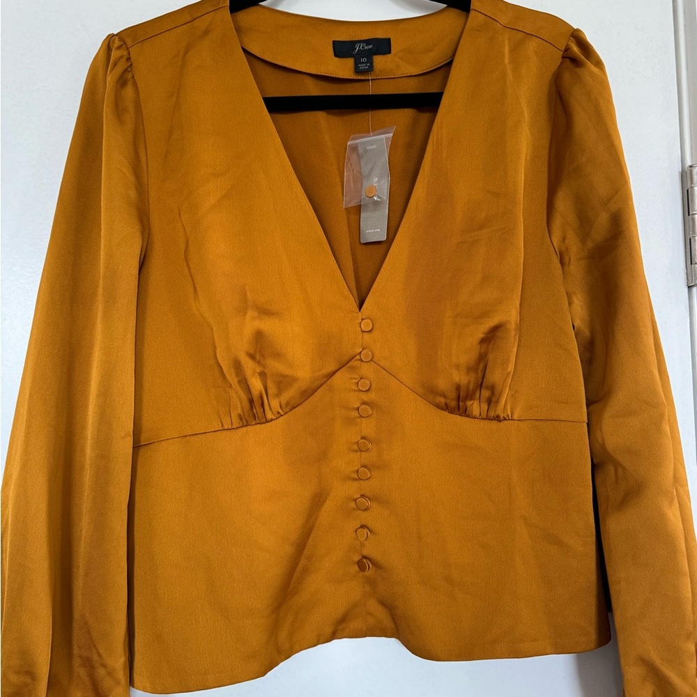 Never worn gold J. crew top with all original tags included